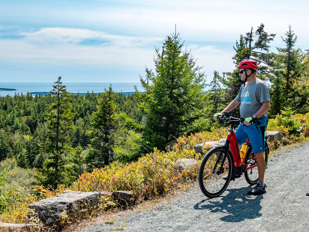 Guest taking a break on the Coast of Maine Bike Tour